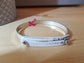 Bracelet des ateliers clause en python  20 cm